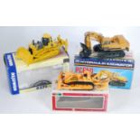 A Komatsu mainly 1/50 scale earth moving construction diecast group to include a First Gear