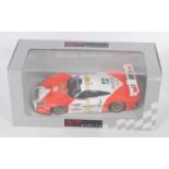 A UT Models No. 39722 1/18 scale model of a 1997 Porsche GT1E 911 race car finished in orange and