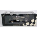 A Minichamps model No. 18085011 1/18 scale model of a 1985 ED Angelis Lotus Renault 1970 Formula 1