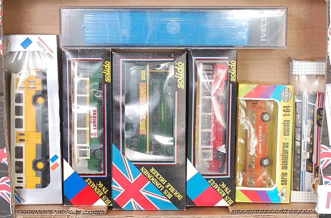 Two boxes containing a large quantity of mixed modern release diecast public transport buses, to