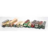 A collection of various white metal, resin, and diecast as released kit built public transport