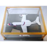 A plastic hand built scale model of a Learjet N35IGL twin turbo fan Executive Aircraft, finished