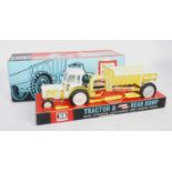 A Britains No. 9630 Shawnee Poole tractor and rear dump, rare example finished in yellow, model