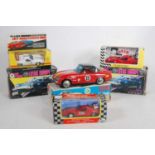 Six various boxed diecast and tinplate Lotus related vehicles to include an ATC Asahi Toy Co Ltd,