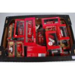 One tray containing a quantity of mixed scale Coca Cola related diecast vehicles and accessories,