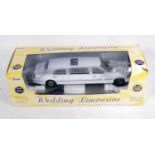 A Top Game Toys Incorporated special edition 1/18 scale model of a Lincoln Town Car stretch