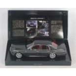 A Minichamps 1/18 scale model of a Bentley Arnage T saloon finished in dark metallic graphite