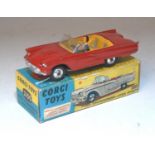 A Corgi Toys No. 215S Ford Thunderbird open sports comprising of red body with yellow interior and