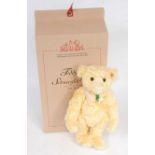 A Steiff Snowdrop teddy bear, white tag to ear numbered 661563, limited edition No. 649/2000