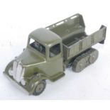 A Britains military series No. 1433 British Army covered tender with driver figure, comprising green