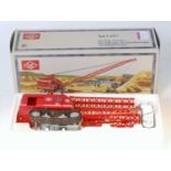 An NZG No. 4401 1/50 scale model of an O&K type L651 tracked drag line crane, finished in O&K red,