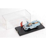 A PL Models 1/43 scale factory built kit of a Porsche 917K 1971 Sebring race car, with mechanic