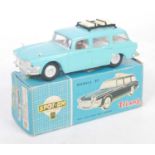 A Spot-On No. 183 Humber Super Snipe estate car comprising of turquoise body with grey interior,