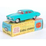 A Corgi Toys No. 238 Jaguar Mk10 comprising of pale green body with red interior and spun hubs