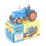 A Corgi Toys No. 60 Fordson Power Major tractor comprising of blue body with orange plastic hubs and