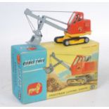 A Corgi Toys No. 1128 Priestman Luffing Shovel comprising of orange and yellow body with black