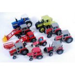 One tray containing ten various mixed Britains farm tractors to include a Britains Ford TW35
