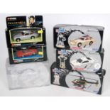 A collection of boxed Corgi James Bond 007 diecast models and action figures to include Aston Martin
