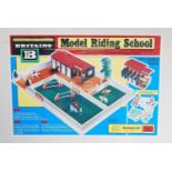 A Britains No. 4714 Riding School Playset, housed in the original white ground labelled all-card