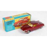 A Corgi Toys No. 259 Le Dandy Coupe, comprising of maroon body with yellow interior and wirework