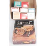A collection of 1/43 and 1/24 scale white metal plastic and resin classic car kits all appear