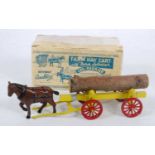 A Benbros Qualitoy boxed model of a farm log carrier, comprising of yellow body with red spoked
