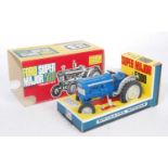 A Britains No. 9527 Ford Supermajor 5000 tractor, comprising blue body with grey fixtures and
