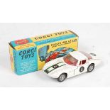 A Corgi Toys No. 324 Marcos 1800 GT comprising of red body with red interior and racing No. 4 with