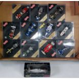 12 various boxed/plastic cased Onyx and Quartzo 1/43 scale F1 racing diecasts, mixed examples to