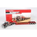 A TWH Collectables Model No. DHS0100 model of a Mammoet Store Peterbilt tractor unit with low loader
