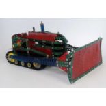 A Meccano home-built model of a Caterpillar crawler dozer, length 47cm, max height to exhaust