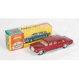 A Corgi Toys No. 247 Mercedes Benz 600 Pullman comprising of metallic maroon body with off-white