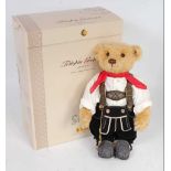 A Steiff Wedding Party series Grandfather teddy bear, gold blond mohair example, dressed in the