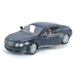 A Minichamps 1/18 scale model of a Bentley Continental GT finished in black with brown interior,
