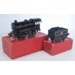1954-61 Hornby type 50 clockwork loco and tender, 0-4-0 BR lined black 60199 (NM-BG) with key,