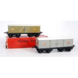 Two Hornby NE No. 2 luggage vans, both 1934-6 black base, light grey body, smaller gold 'NE',