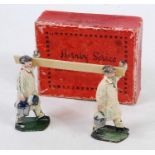 A Hornby series No. 13 Hawes Distemper advertisement figure group to include two men in overalls,