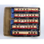 Five Hornby Dublo tinplate D12/20 maroon and cream coaches: restaurant; 3x 1st/3rd and one Br/3rd,