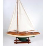 A very well made possibly kit built wooden and GRP hulled sailing yacht, comprising of dark green