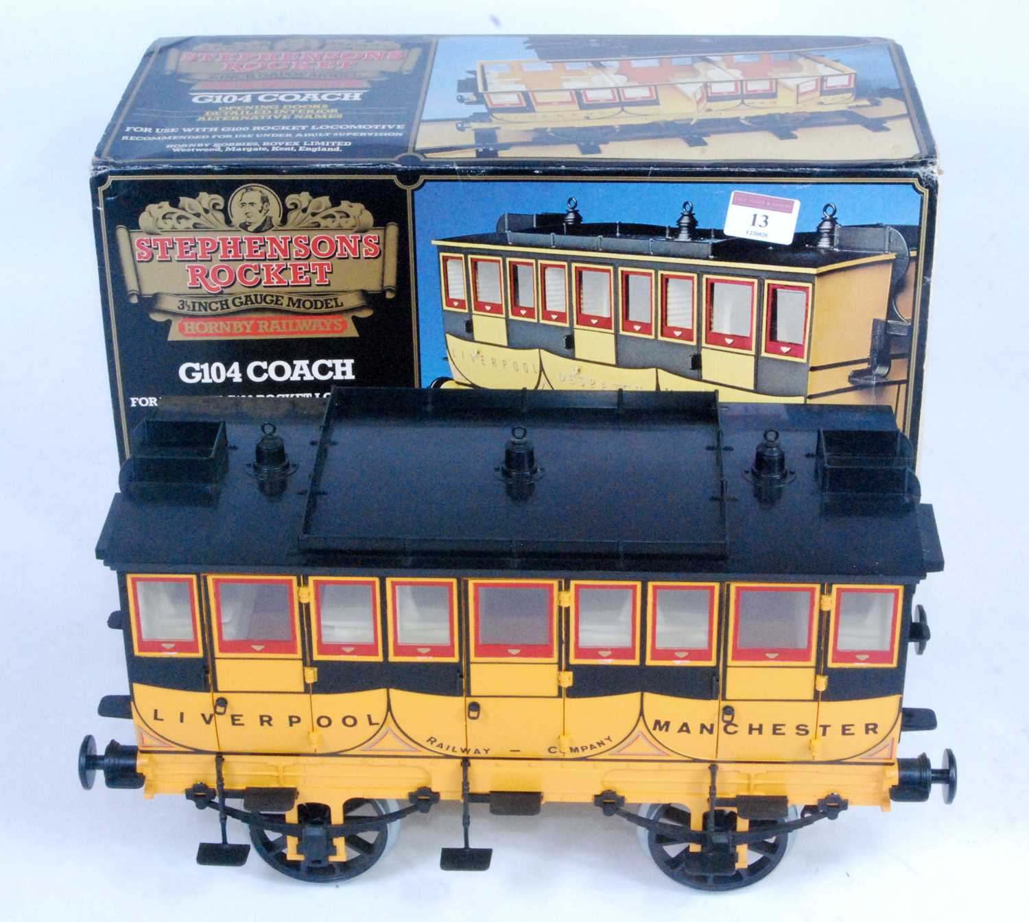A Hornby G104 coach for Rocket locomotive, appears unused and complete with name transfers