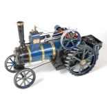 A static display model of an agricultural traction engine, approx 1" scale, finished in blue with
