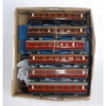 Eight Hornby Dublo D3 LMS tinplate coaches; 4 each 1st/3rd and Br/3rd, overall (F-G), two are