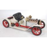 A Mamod No. SA1 steam roadster, comprising of usual specification with white body, red spoke hubs,