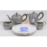 A 'Manor period' hammered pewter four piece tea and coffee set, together with two bone china