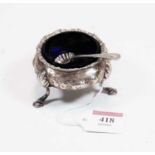 An early Victorian silver table salt, raised on stepped hoof feet, with blue glass liner, London