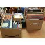 Three boxes containing a collection of various books and records to include Kirklands The Modern