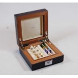 An Elie Bleu of Paris fitted box containing a collection of interchangeable cufflinks