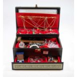 A fitted jewellery box and contents of assorted costume jewellery, to also include Swarovski cut