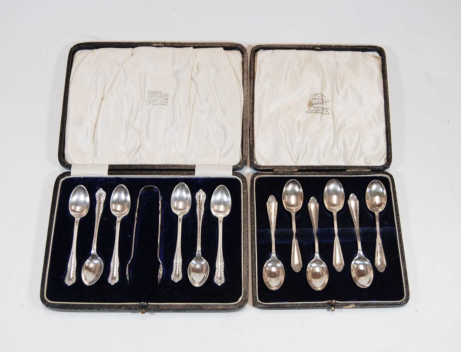 A set of six George V silver teaspoons, together with matching sugar tongs, in fitted leather