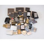 A box of miscellaneous pocket cigarette lighters mainly being Zippo, many boxed